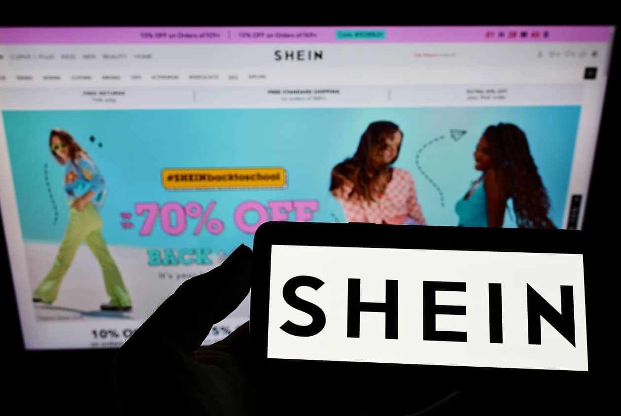 Stuttgart,,Germany,-,Aug,14,,2021:,Person,Holding,Smartphone,With