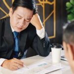 Phot d'un homme d'affaires asiatique qui travaille